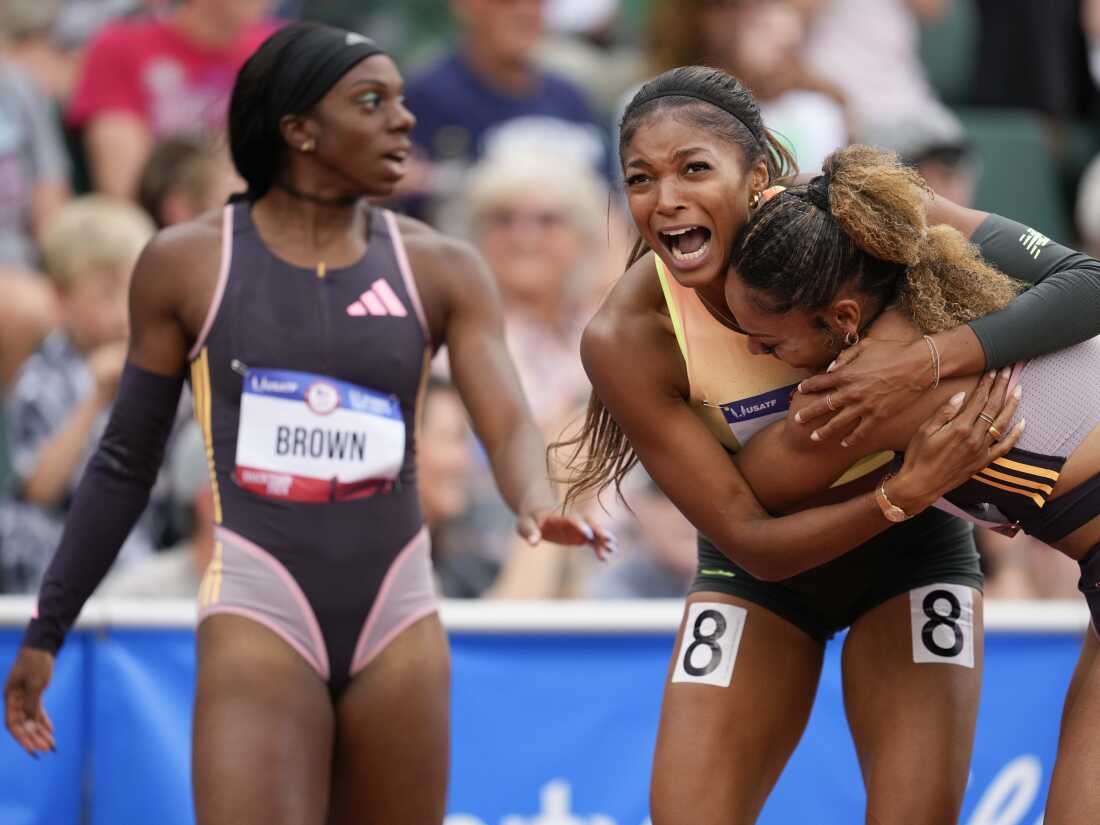 Gabby Thomas celebrates after winning the women's 200 meter final with third place McKenzie Long during the U.S. Olympic Track and Field Team Trials, Saturday, June 29, 2024, in Eugene, Oregon. 