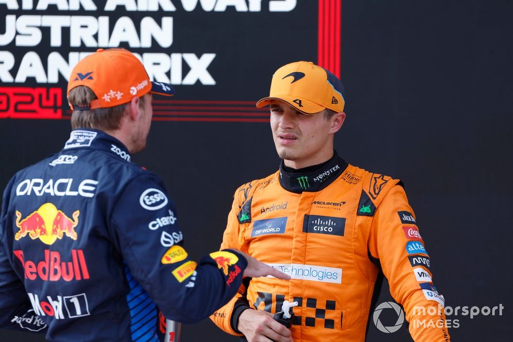 Pole sitter Max Verstappen, Red Bull Racing, Lando Norris, McLaren F1 Team, speaks at Parc Fermé