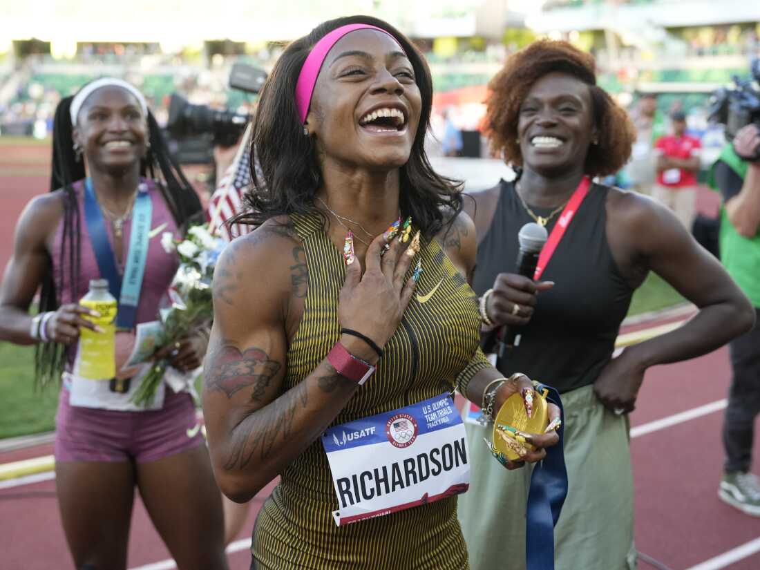 Sha'Carri Richardson celebrates her victory in the women's 100-meter final at the U.S. Olympic Track and Field Team Trials on Saturday in Eugene, Ore.